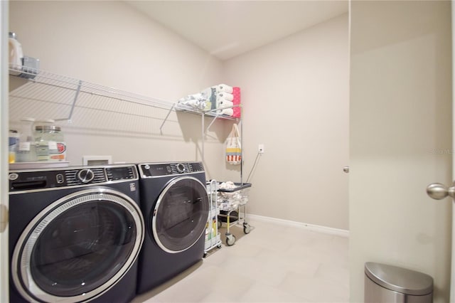 16926 Harvest Moon Way, Bradenton, FL 34211 - laundry room featuring separate washer and dryer, tile patterned floors, and baseboards