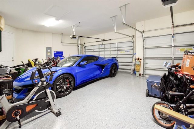 16926 Harvest Moon Way, Bradenton, FL 34211 - garage with a garage door opener and electric panel