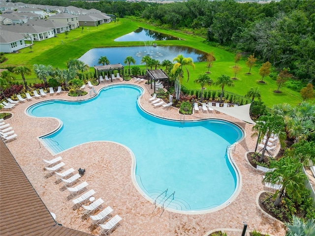 16926 Harvest Moon Way, Bradenton, FL 34211 - community pool featuring a water view and a patio