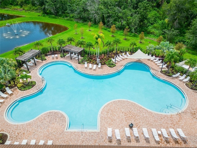 16926 Harvest Moon Way, Bradenton, FL 34211 - view of swimming pool with a gazebo, a water view, and view of wooded area