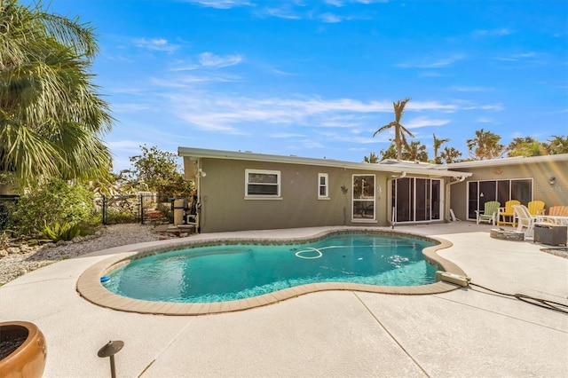 view of pool featuring a patio area