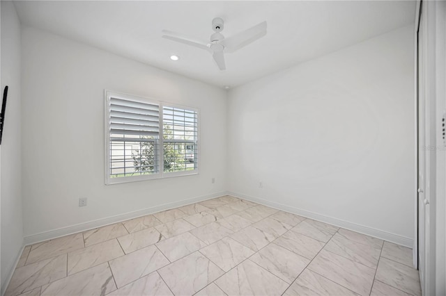 spare room featuring ceiling fan