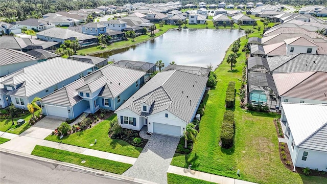 drone / aerial view with a water view