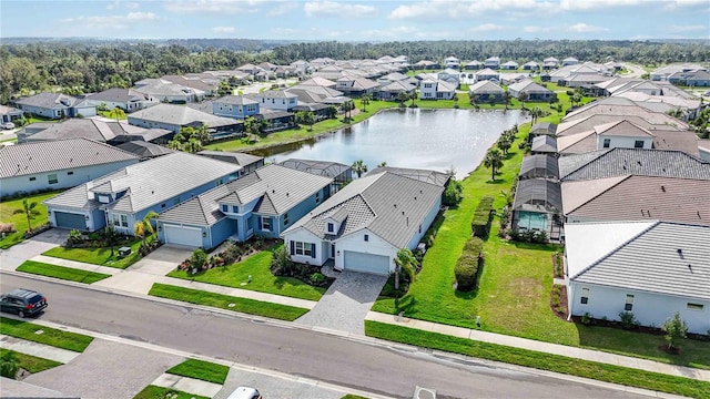 drone / aerial view with a water view