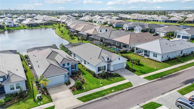 drone / aerial view featuring a water view