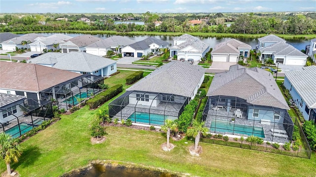 drone / aerial view featuring a water view