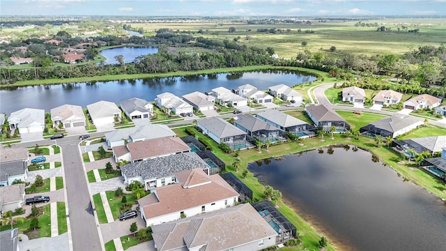 drone / aerial view with a water view