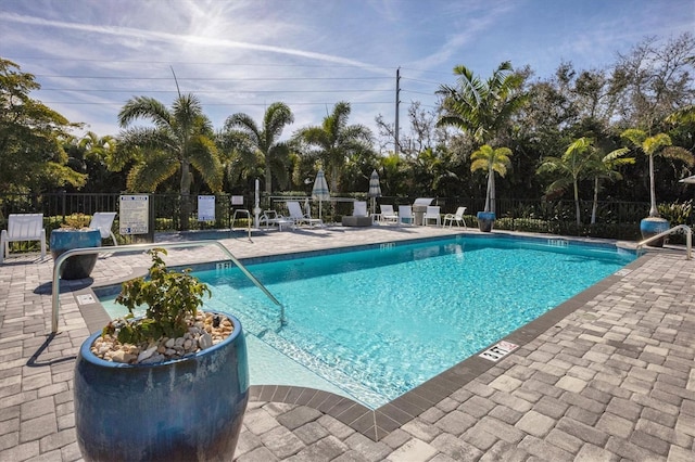 view of swimming pool featuring a patio