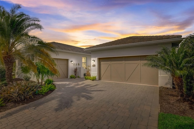 view of front of home with a garage