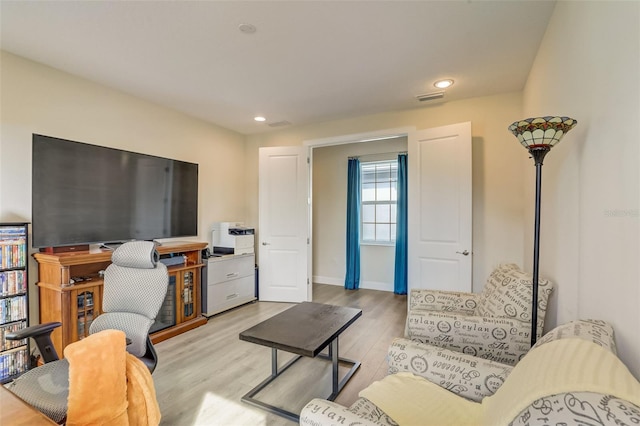 living room featuring light hardwood / wood-style floors