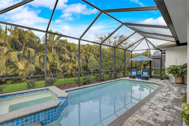 view of pool featuring a lanai, an in ground hot tub, and a patio