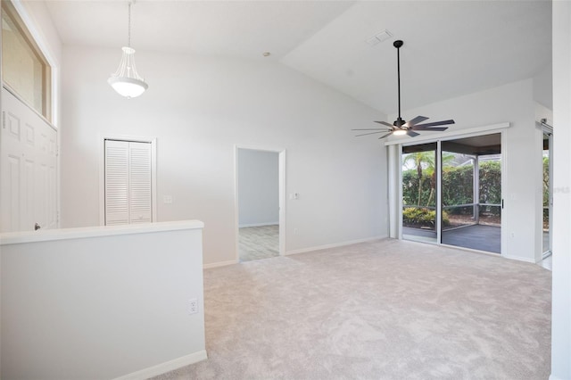 unfurnished room featuring carpet floors, high vaulted ceiling, visible vents, and baseboards