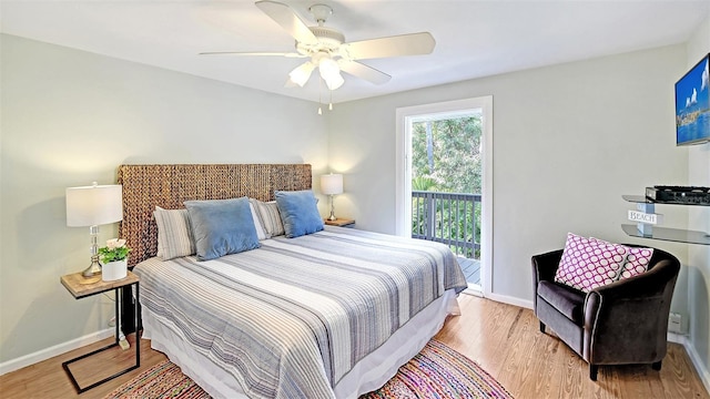 bedroom with access to exterior, ceiling fan, and light wood-type flooring