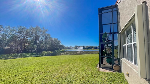 view of yard with a water view