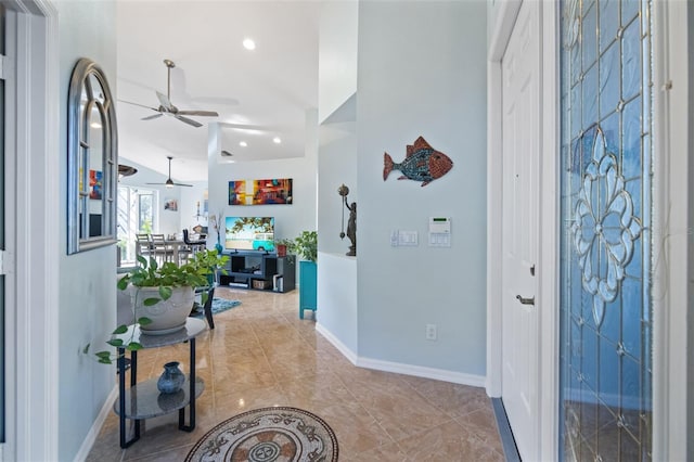 entryway featuring ceiling fan