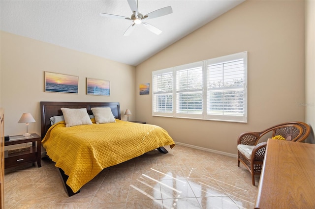 bedroom with light tile patterned floors, vaulted ceiling, and ceiling fan