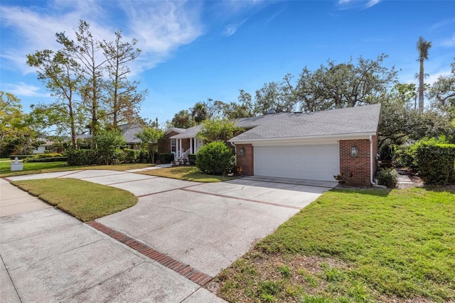 single story home featuring a garage and a front lawn