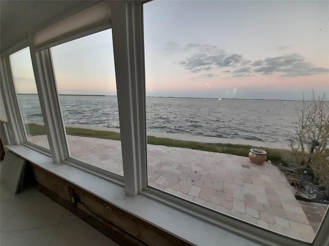 property view of water featuring a beach view