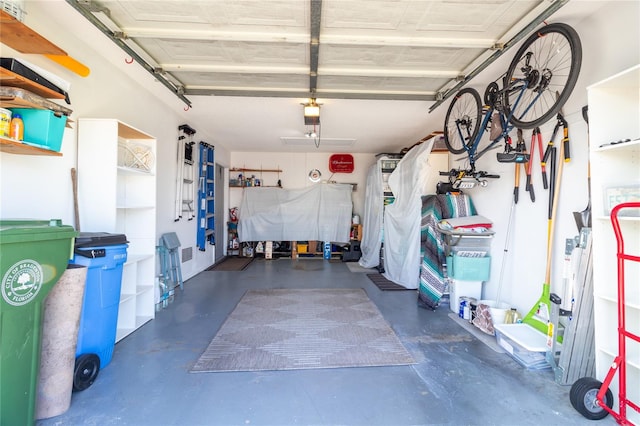 garage featuring a garage door opener