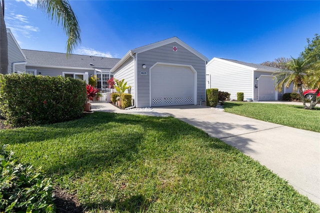 ranch-style house with a front yard and a garage