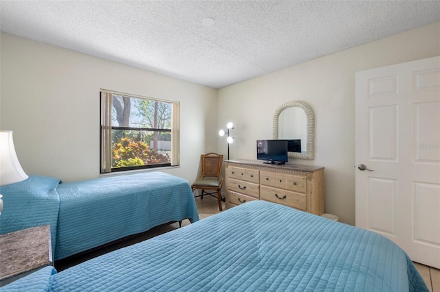 bedroom with a textured ceiling