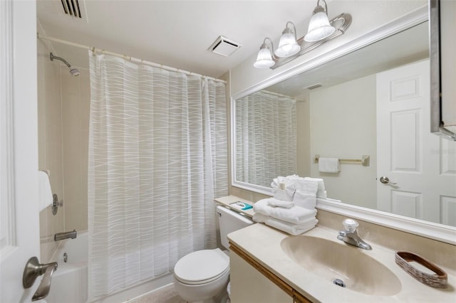 full bathroom with shower / bath combo with shower curtain, vanity, and toilet