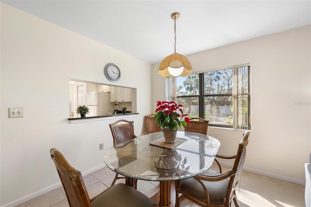 view of tiled dining space