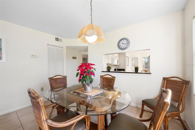 view of tiled dining room