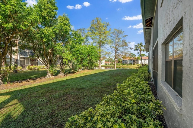 view of yard with a water view