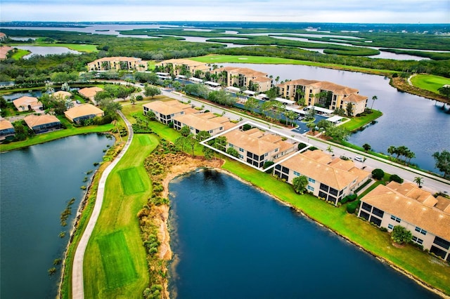 drone / aerial view with a water view