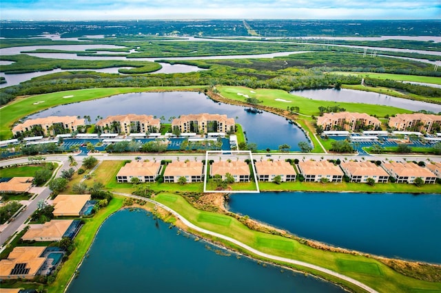 drone / aerial view with a water view