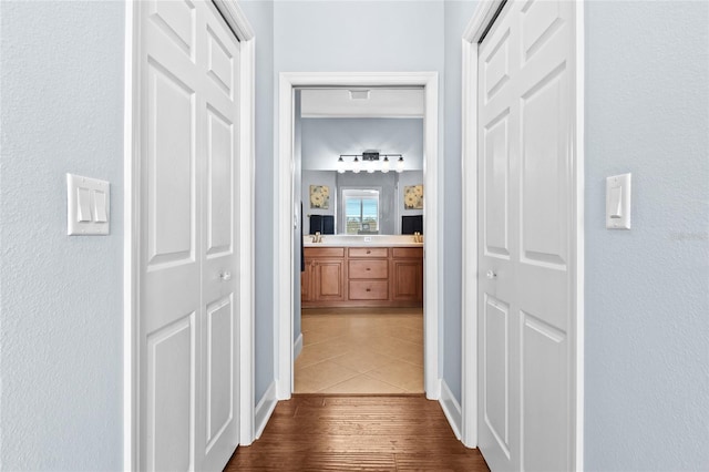 corridor with dark wood-type flooring