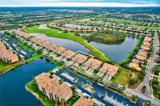 drone / aerial view with a water view