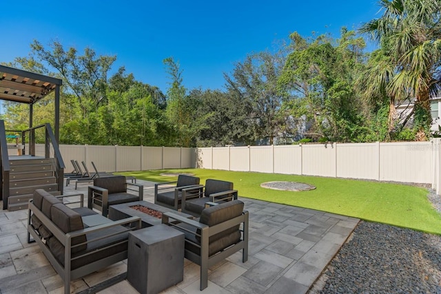 view of patio / terrace featuring a fire pit