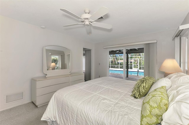 carpeted bedroom with ceiling fan and access to exterior