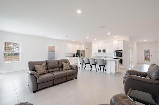 tiled living room with sink