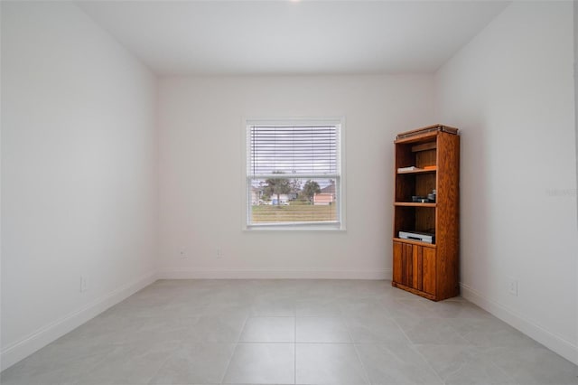 empty room featuring light tile patterned flooring