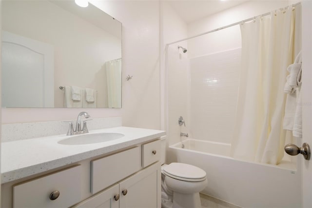 full bathroom featuring vanity, toilet, and shower / bathtub combination with curtain