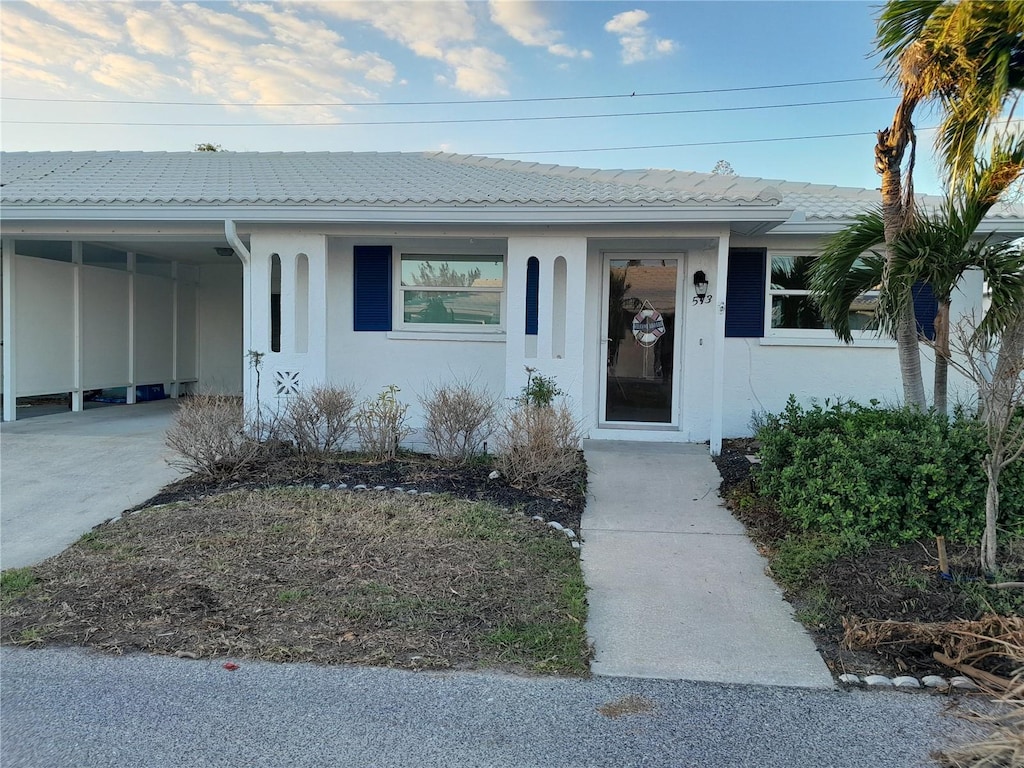 view of front of house featuring a carport