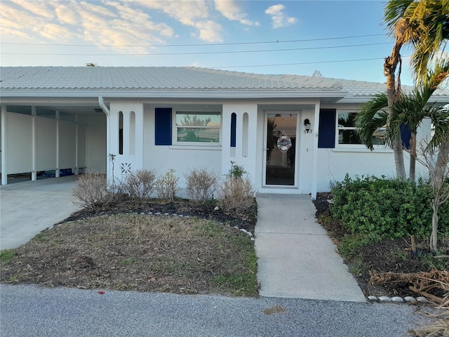 view of front of house featuring a carport