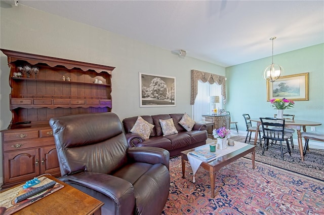 living room with a chandelier