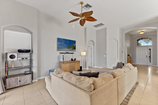 living room featuring ceiling fan and light tile patterned floors