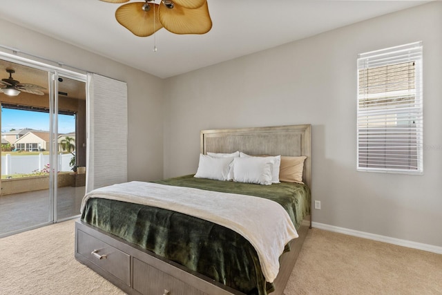 carpeted bedroom with ceiling fan and access to outside