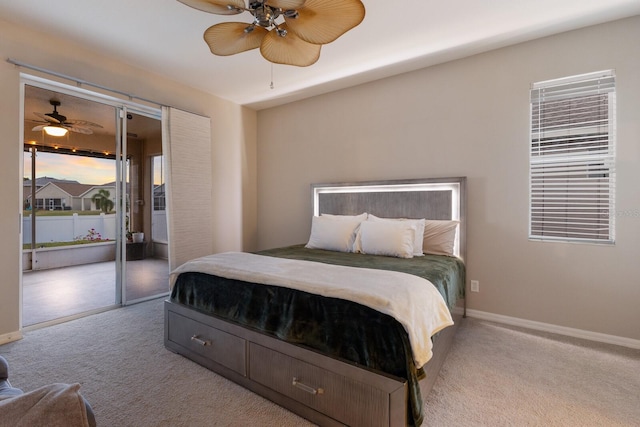 bedroom with a closet, light colored carpet, and ceiling fan