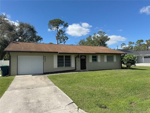 4121 Durant St, Port Charlotte, FL 33948 - ranch-style house featuring a front yard and a garage