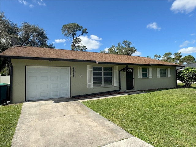 ranch-style home featuring central AC unit, a garage, and a front lawn