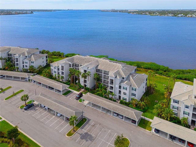 drone / aerial view with a water view