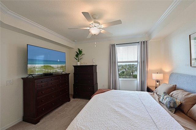 bedroom with ceiling fan, light colored carpet, and crown molding