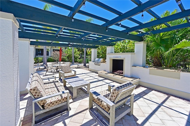 view of patio featuring a pergola, area for grilling, and an outdoor living space