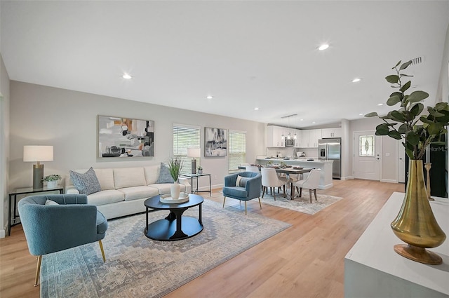 living room with light wood-type flooring